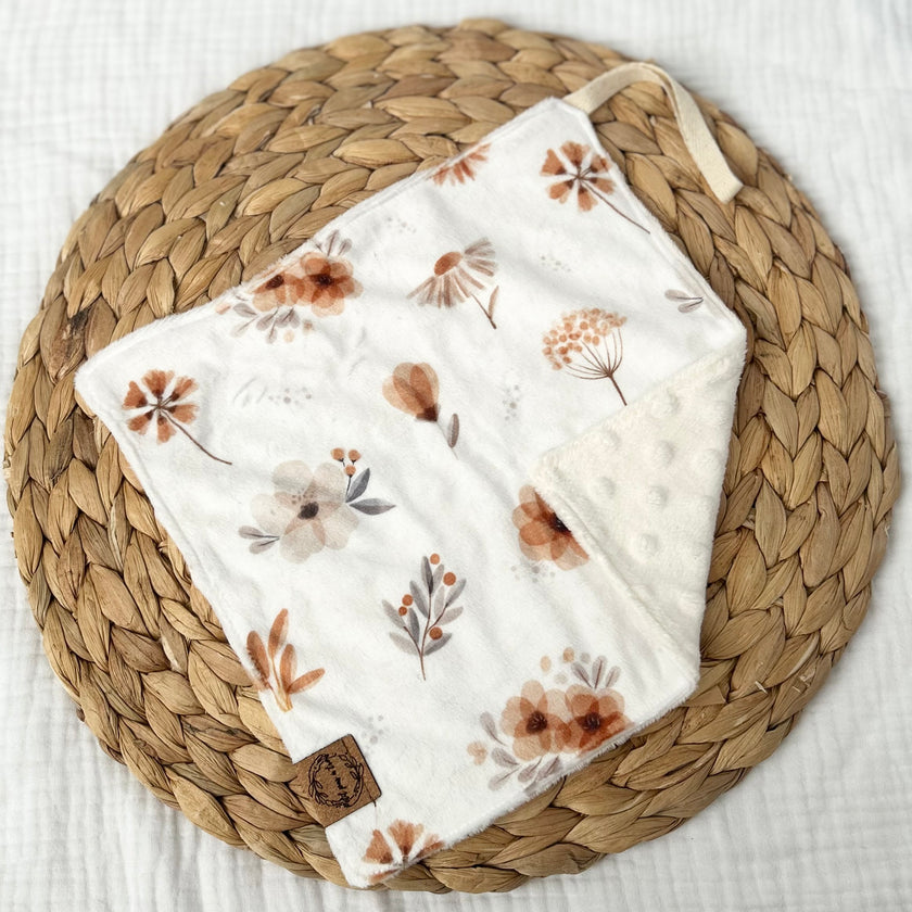 Doudou attache-suce prête-à-partir