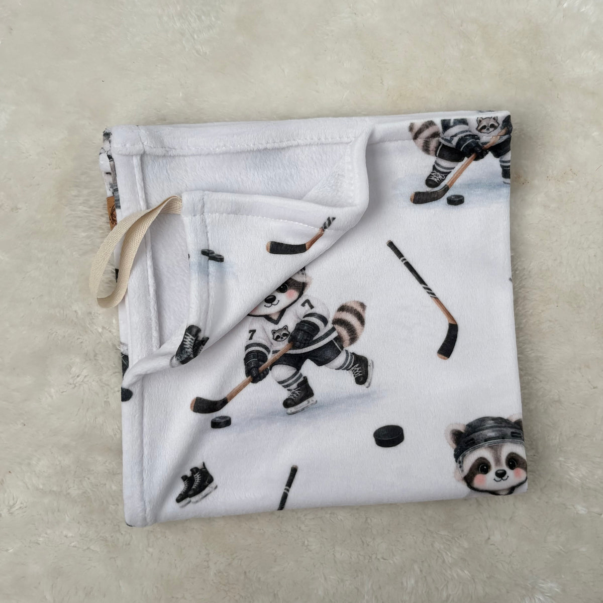 Attache-suce douceur - Raton hockeyeur