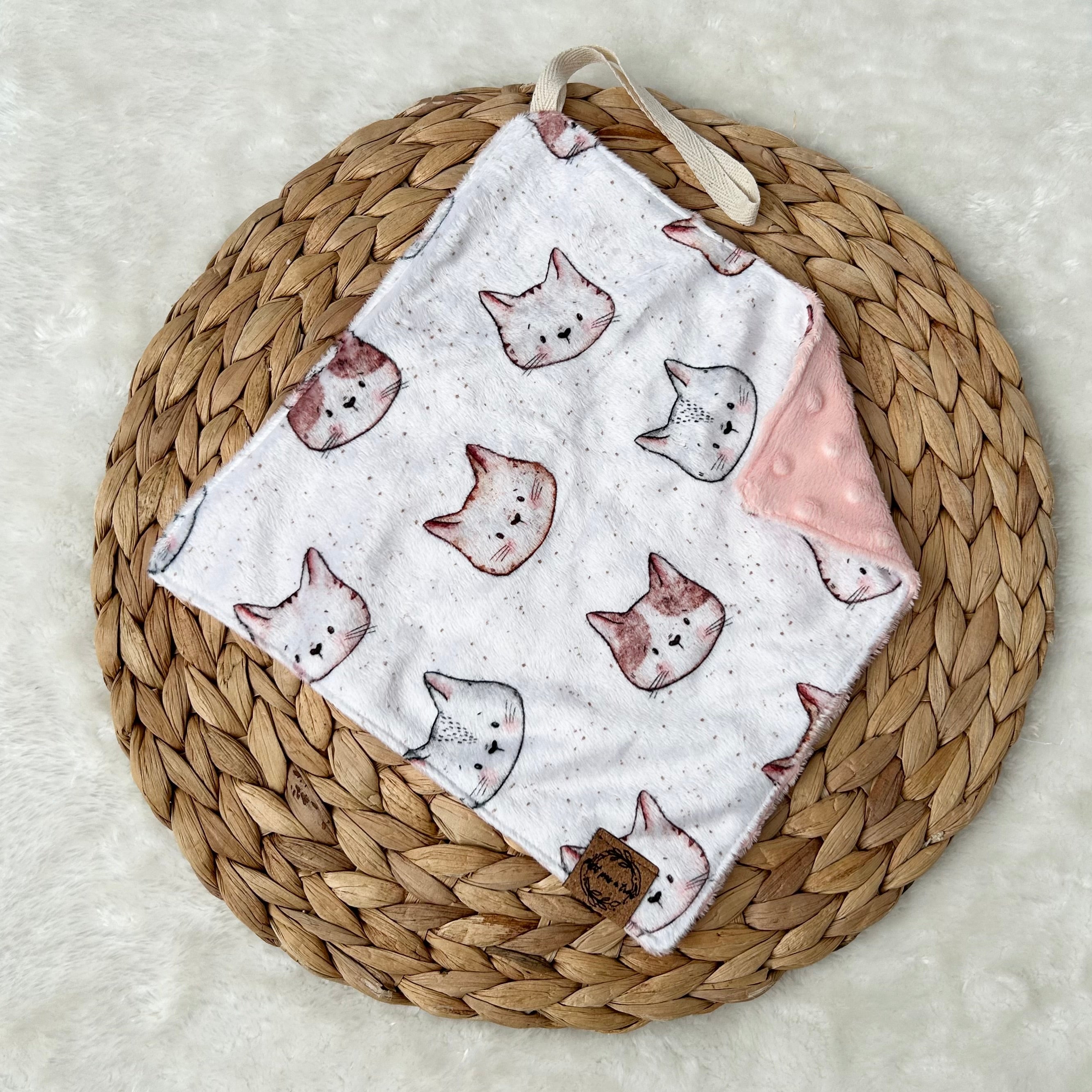 Doudou attache-suce prête-à-partir