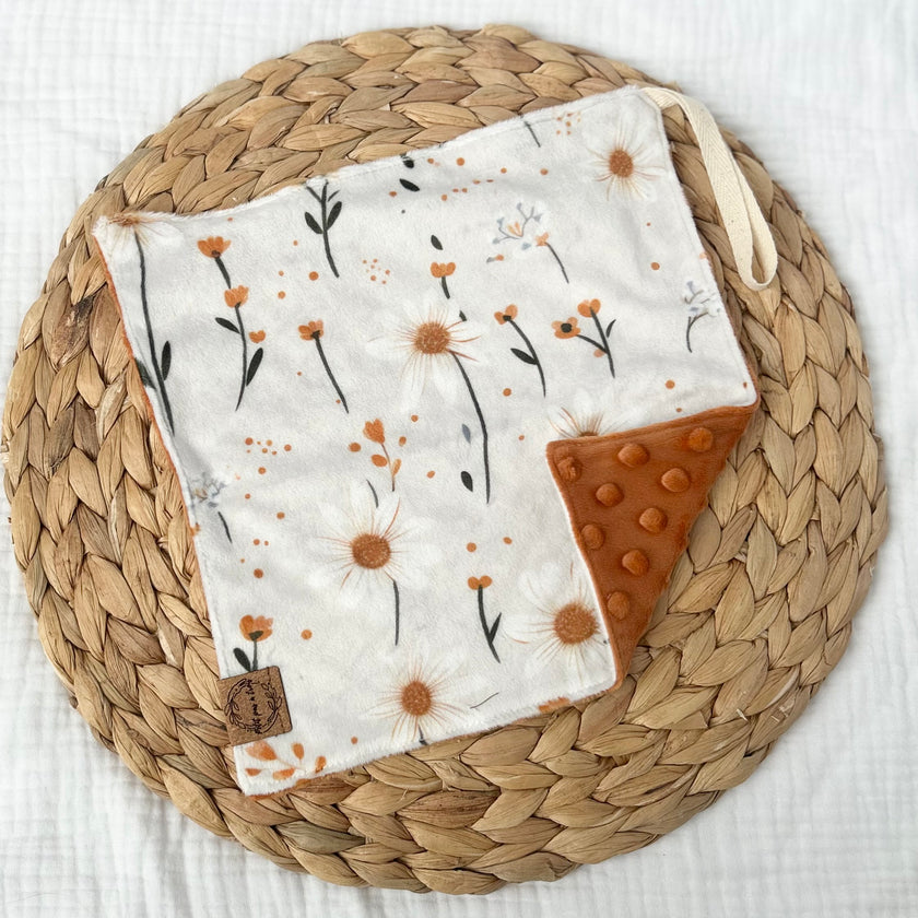 Doudou attache-suce prête-à-partir