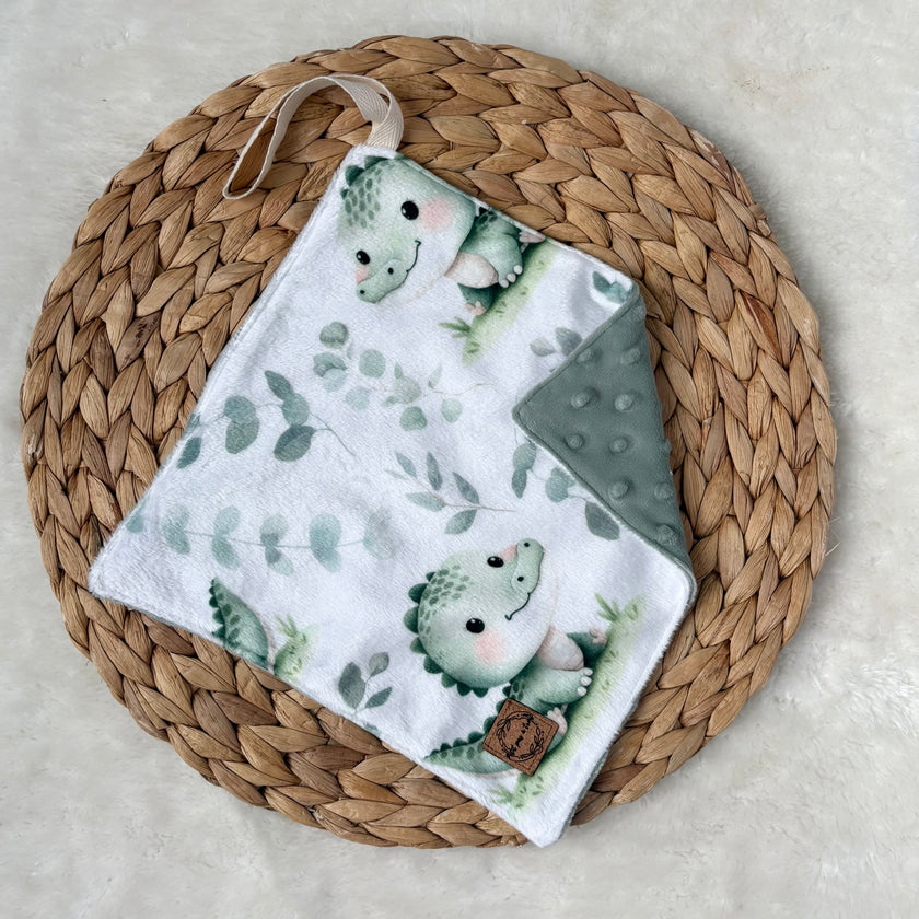 Doudou attache-suce prête-à-partir