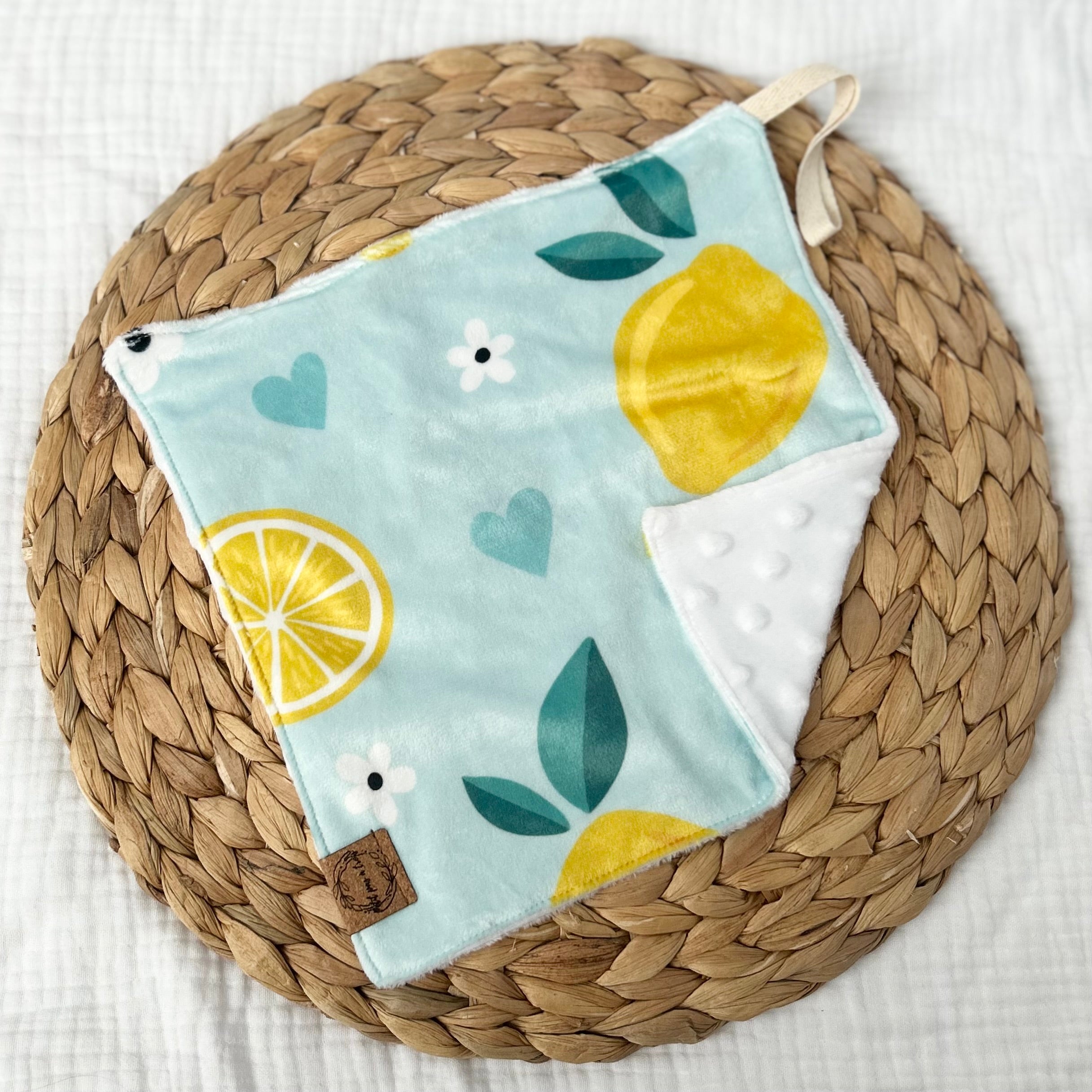 Doudou attache-suce prête-à-partir