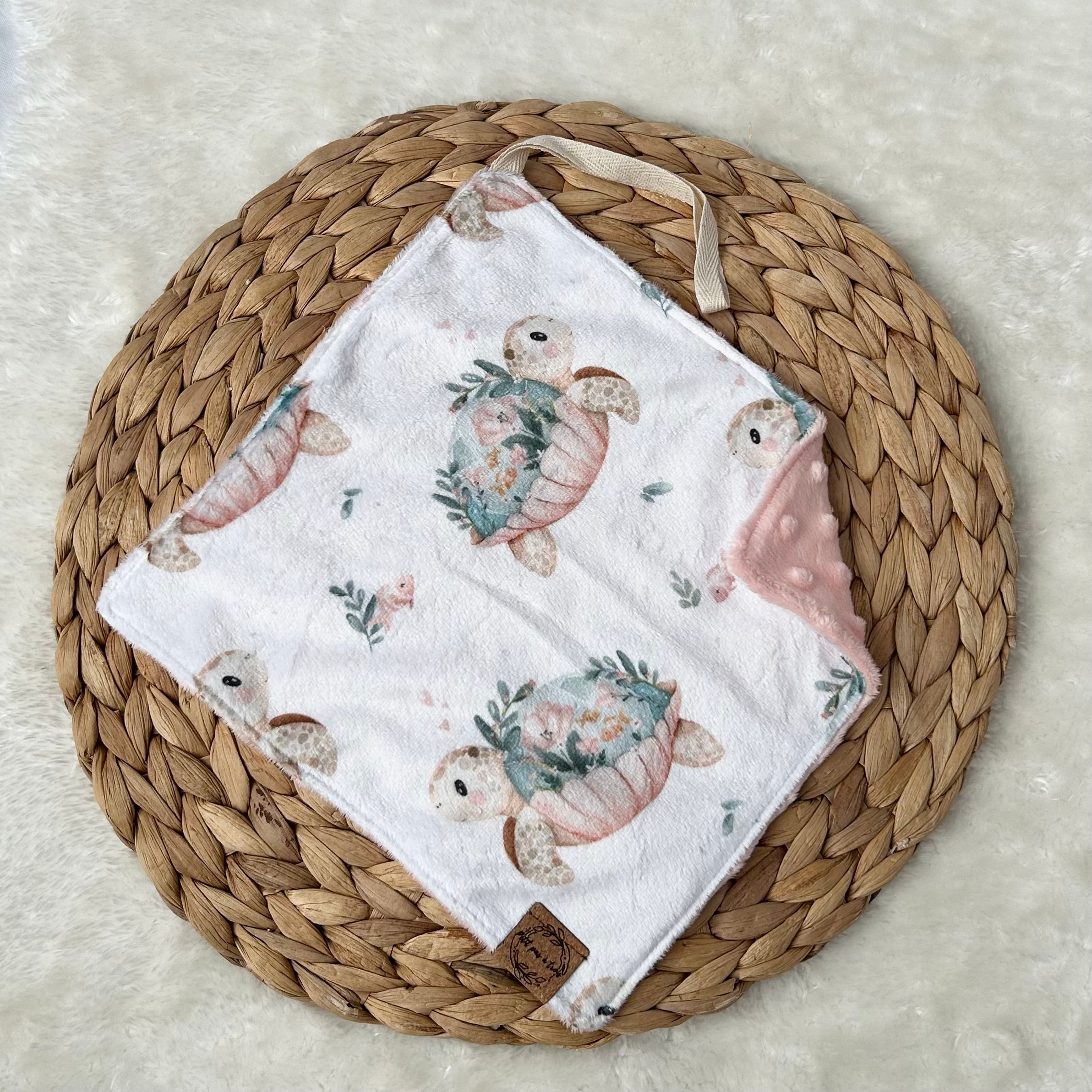 Doudou attache-suce prête-à-partir