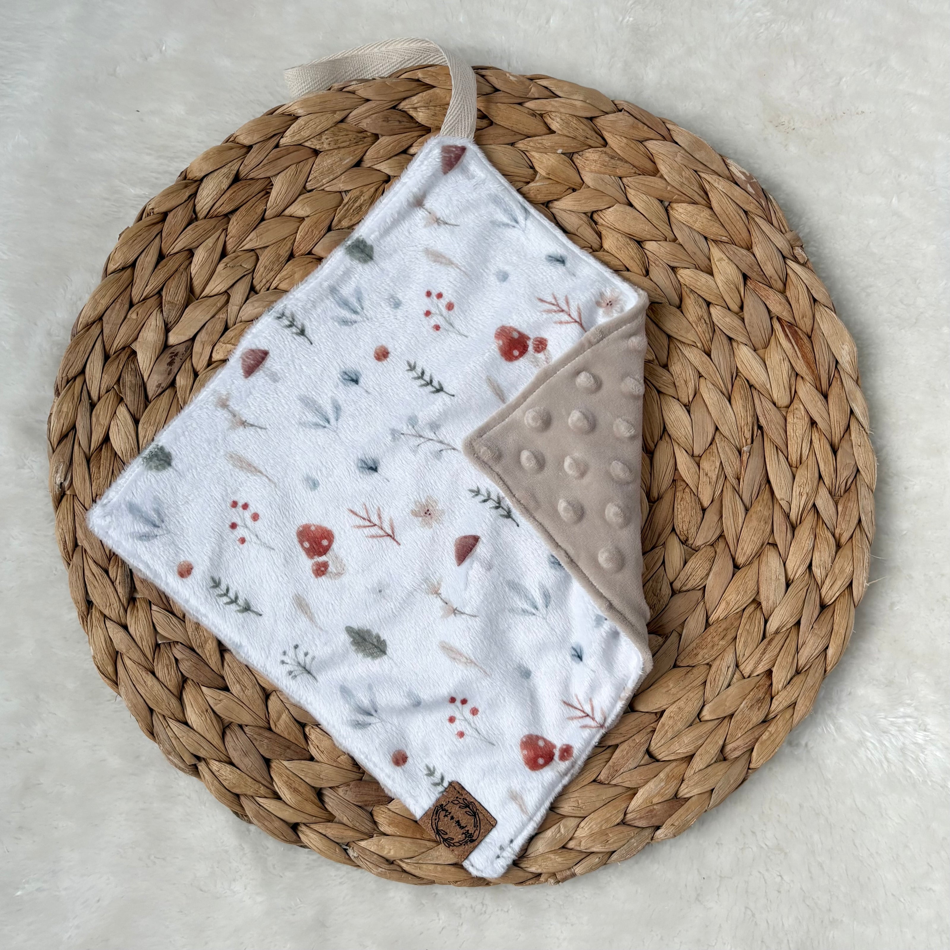 Doudou attache-suce prête-à-partir