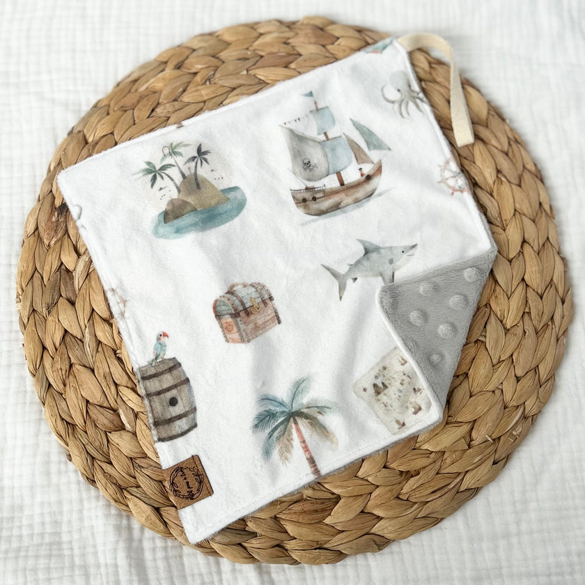 Doudou attache-suce prête-à-partir