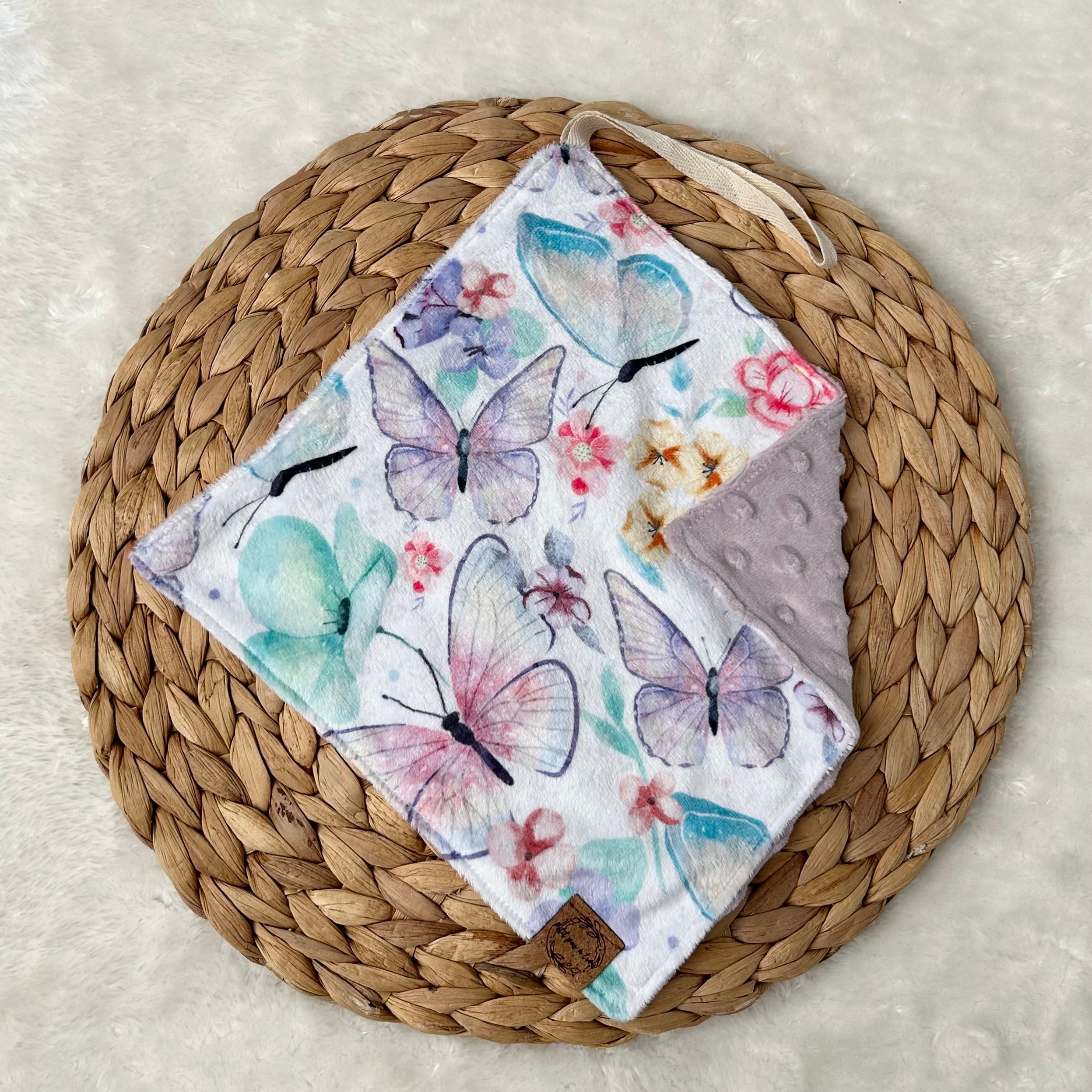 Doudou attache-suce prête-à-partir