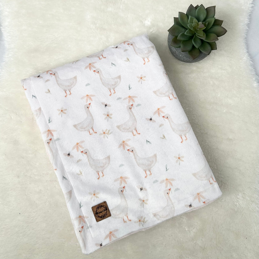 Couverture en minky - Oies fleuris