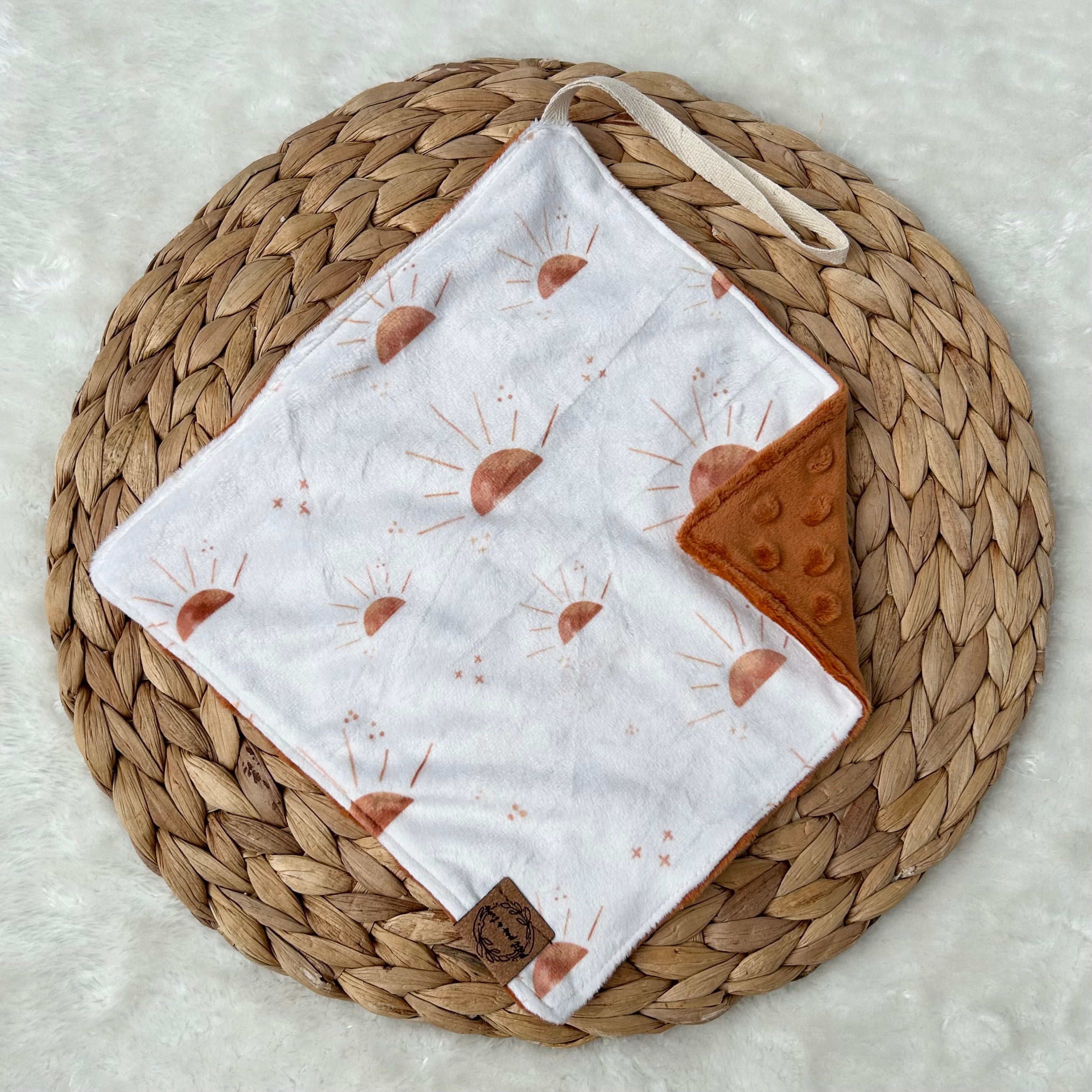 Doudou attache-suce prête-à-partir